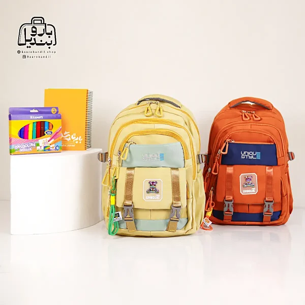 تصویر اختصاصی از نمای جلوی کوله پشتی مدرسه یونیک ۱۰۱۱ در رنگ خردلی نارنجی