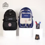 تصویر اختصاصی از نمای جلوی کوله پشتی مدرسه یونیک ۱۰۱۴ در رنگ سرمه‌ای مشکی