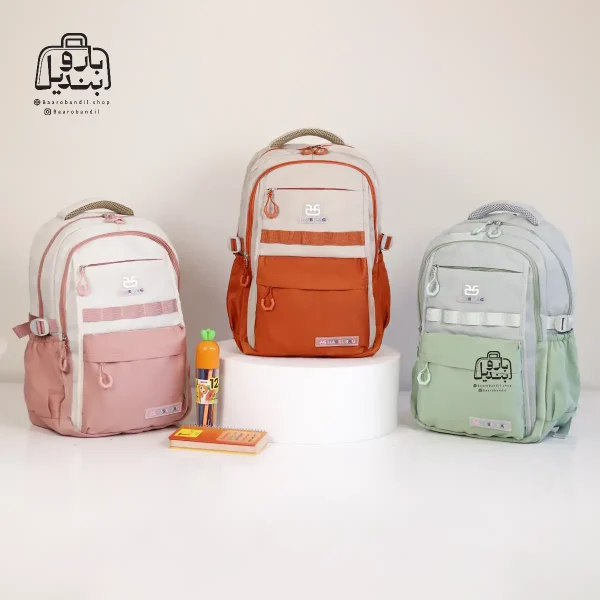 تصویر اختصاصی از نمای جلوی کوله پشتی مدرسه حاصل ۱-۱۵۱۵ در رنگ نارنجی یاسی صورتی