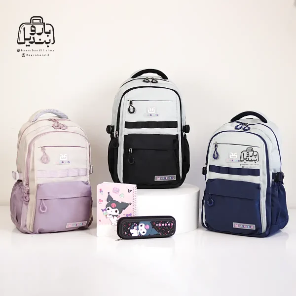 تصویر اختصاصی از نمای جلوی کوله پشتی مدرسه حاصل ۱-۱۵۱۵ در رنگ سرمه‌ای مشکی یاسی