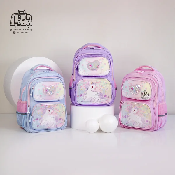 تصویر اختصاصی از نمای جلوی کوله پشتی مدرسه هونکا ۲۶۲۳ در رنگ آبی صورتی یاسی