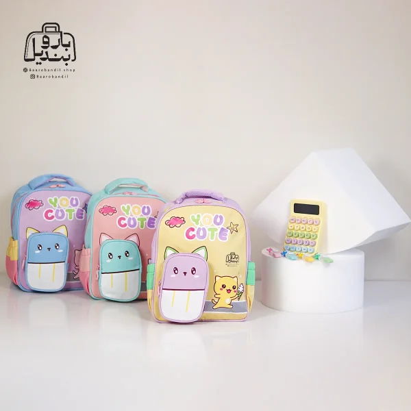 تصویر اختصاصی از نمای جلوی کوله پشتی مهد کودکی you cute کد ۳۴۱۸ در رنگ زرد یاسی صورتی یاسی