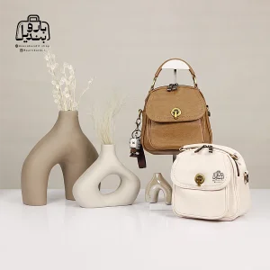 تصویر اختصاصی از نمای جلوی کیف دوشی زنانه موجیتو کد 7603 در رنگ سفید و قهوه‌ای