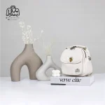 تصویر اختصاصی از نمای جلوی کیف دوشی زنانه موجیتو کد 7603 در رنگ سفید