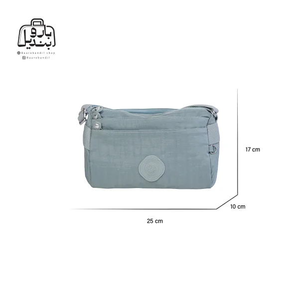 تصویر اختصاصی از نمای جلوی کیف زنانه دوشی بوبو کد ۱۶۴۵ در رنگ آبی همراه با سایزبندی